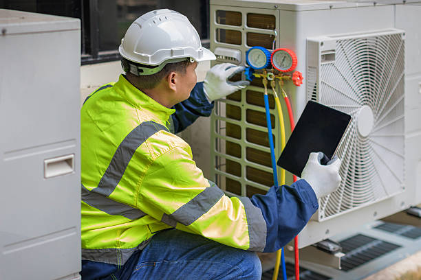 Professional Air Conditioning Repair technician working in Mountain Iron, MN